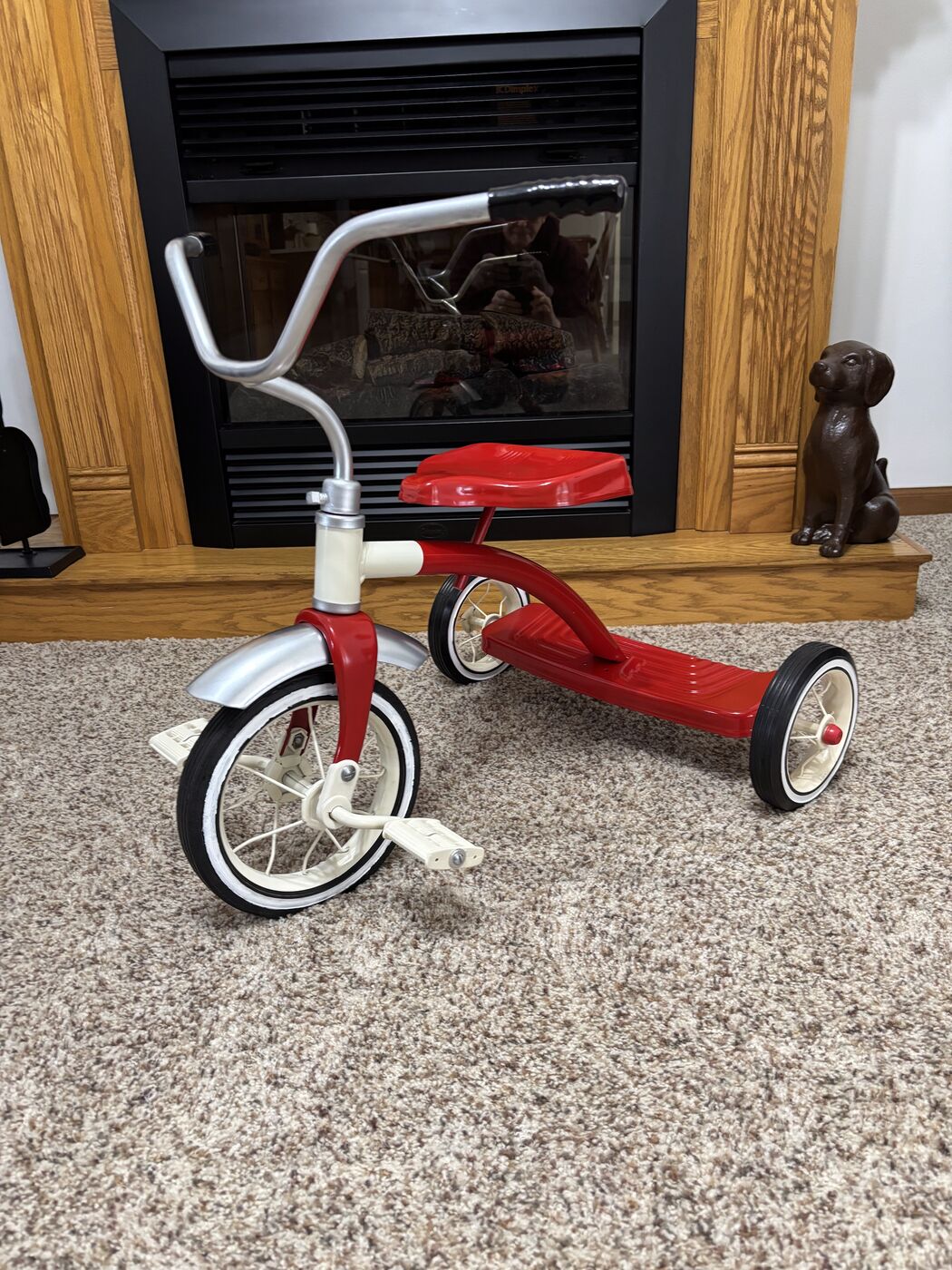 A restored vintage red tricycle